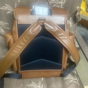 Leather Coach Backpack still brand new with tags just didn’t care for it